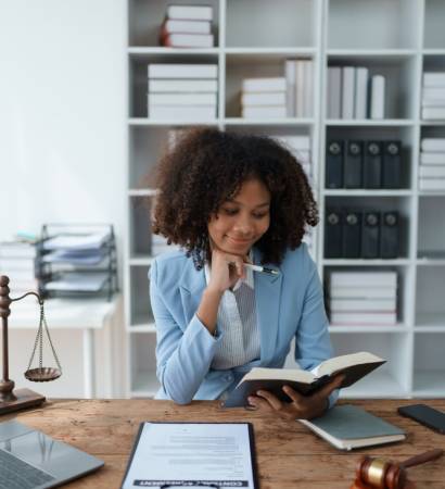 A,Young,Women,African,American,Lawyer,Lawsuit,Studying,Cases,For